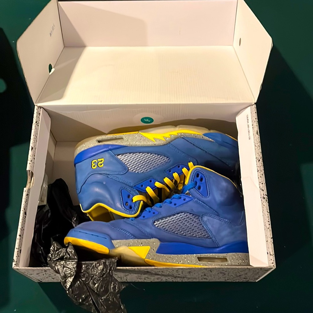 Blue and yellow laney Jordan 5s